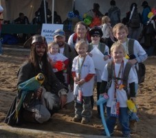 picture of a Jack Sparrow impersonator with children, Parrot Jack , a Johnny Depp impersonator and pirate entertainer with parrot for children's party or special event or pirate party
