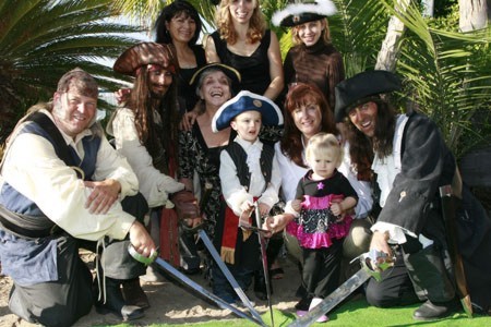picture of pirate entertainers for hire  at a kid's pirate themed party with a jack sparrow impersonator