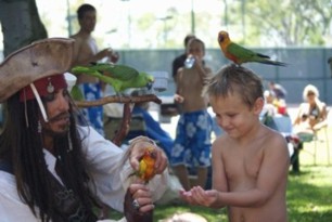 parrot show at a pirate theme children's birthday party with Jack 