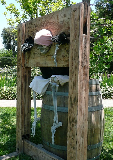 skeleton pirate in stocks