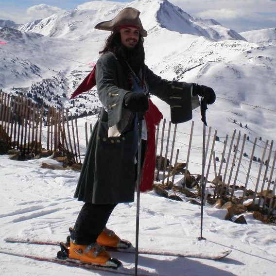 jack sparrow in denver colorado skiing down to a pirate theme party